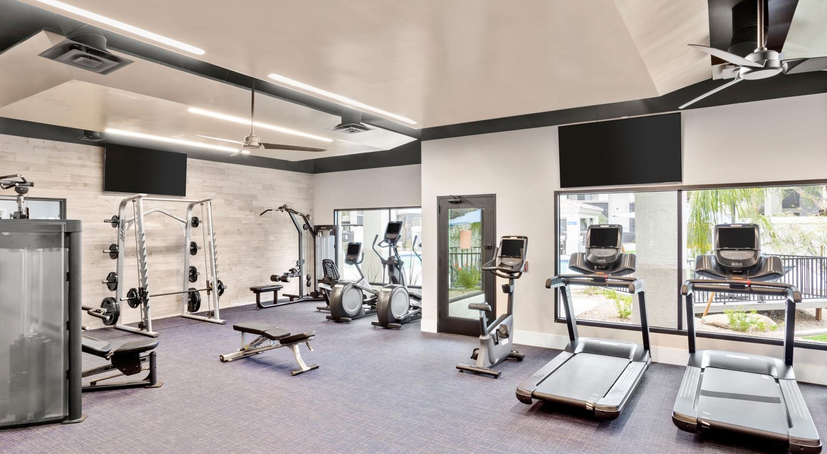 Get your workout on a room with exercise equipment