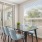 a dining room table with chairs around it