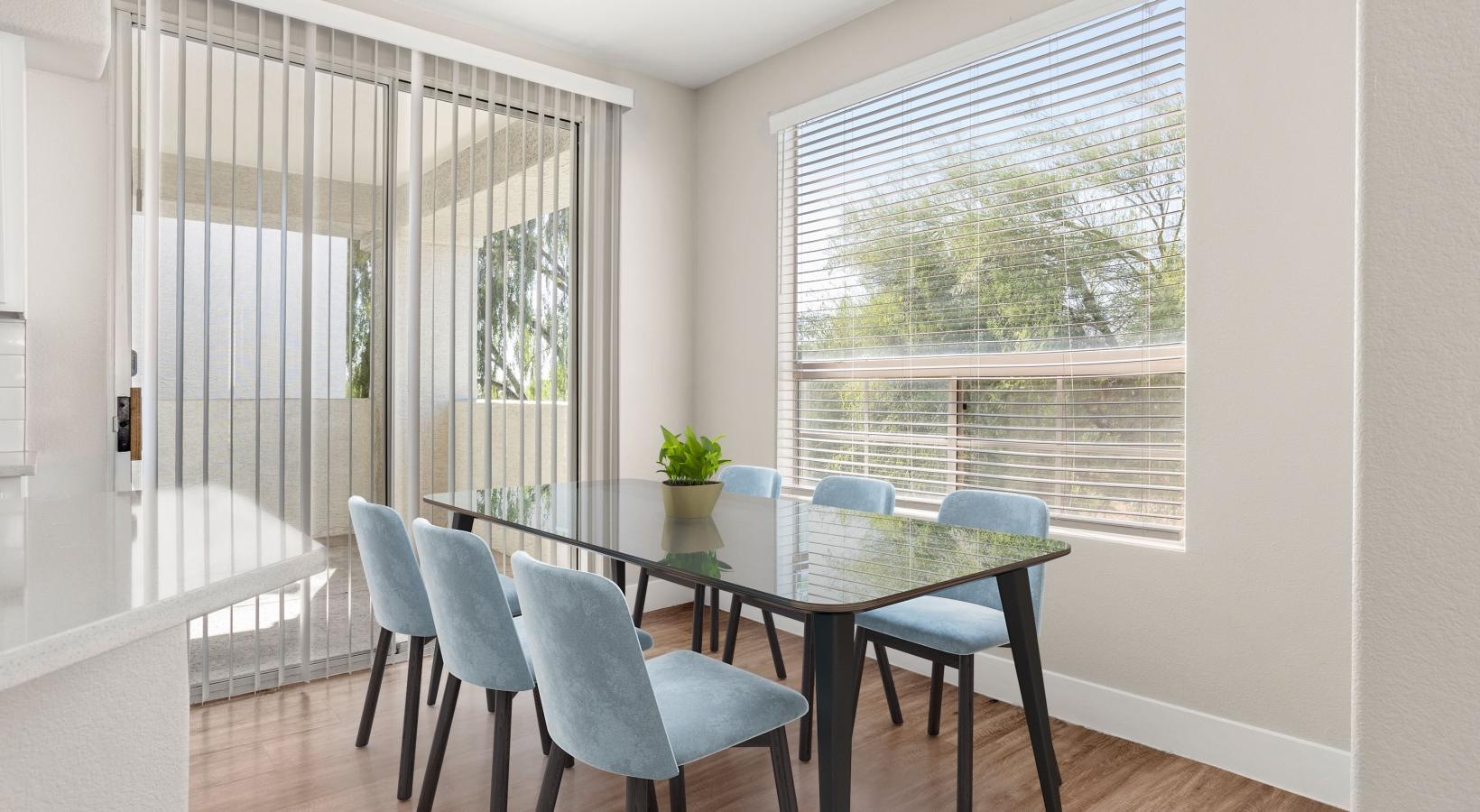 Beautiful living areas to match your lifestyle a dining room table with chairs around it