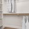 a closet with clothes