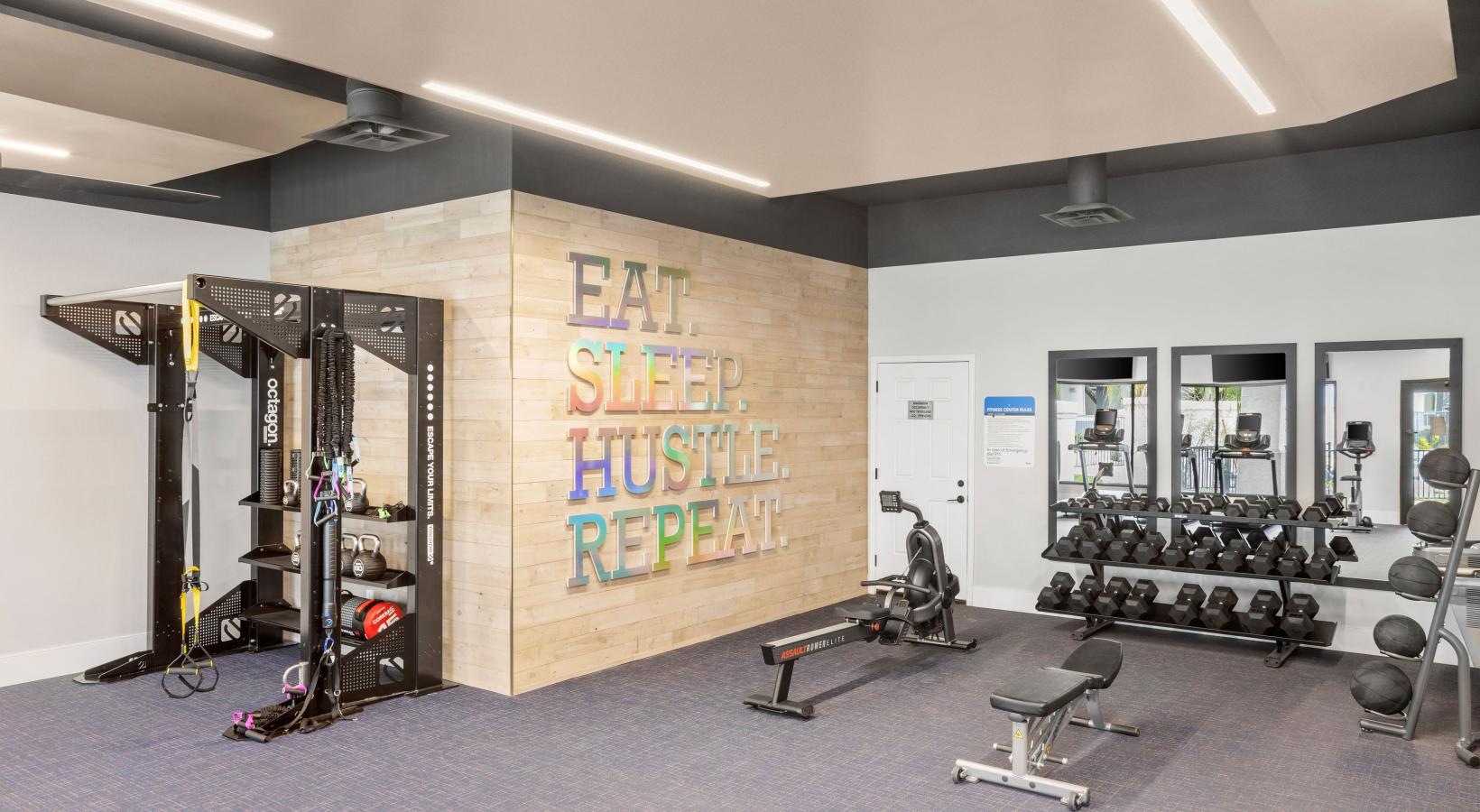 Everything within reach a room with exercise equipment and chairs