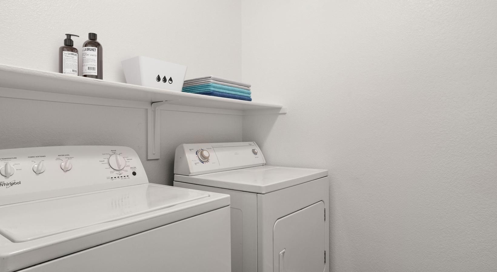 Everything you need right at your fingertips a room with a washer and dryer
